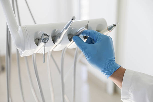 Professional Root Canal Treatment technician working in Forest Hills, MI